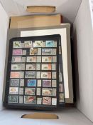 COLLECTABLE STAMPS British Commonwealth in four albums, folder of Canada, album leaves etc, plus