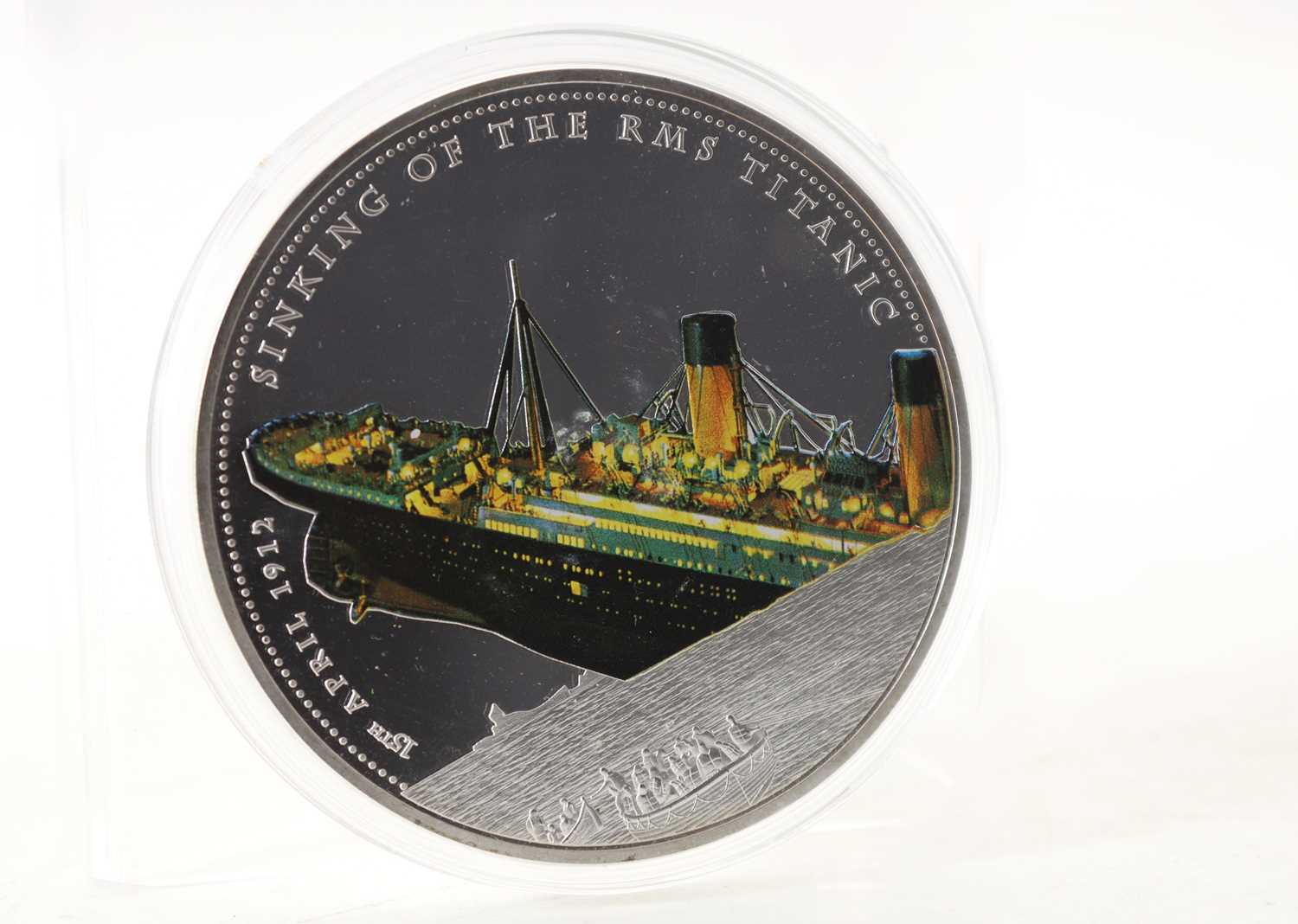 CONSTRUCTION, LAUNCH, SAILING AND SINKING OF THE R.M.S. TITANIC, FOUR OVERSIZED COINS