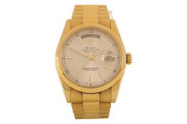 ROLEX, EIGHTEEN CARAT GOLD DAY DATE AUTOMATIC WRIST WATCH