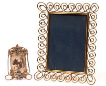 An Edwardian brass wirework photograph frame, 34 x 24cm and a smaller, contemporary Art Nouveau
