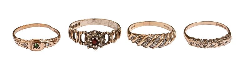 Four rings, three gold and one silver, variously gem set, 4.7g (gold), various sizes Condition