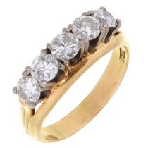 A diamond ring, with line of five round brilliant cut diamonds, in gold marked 18ct, 5.2g, size N