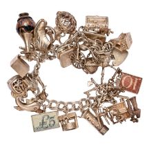 A silver charm bracelet, 2oz 16dwt Condition Report: