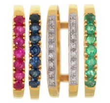 A diamond ring and three interchangeable ruby, sapphire and emerald rings, in 18ct gold, London