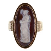 A hardstone cameo ring, associated gold hoop, cameo 2.2cm w, 3.8g Condition Report: Edge of brown