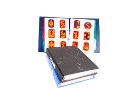 A collection of 20th century US American military cloth badges.