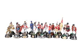 A collection of nineteen assorted painted die cast metal military figures.