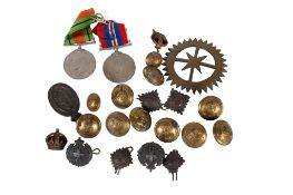A collection of Northhants Regiment buttons and two WWII medals