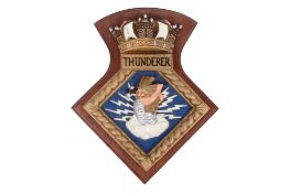 A hand painted metal Royal Navy ships crest for HMS Thunderer and assorted paperwork.