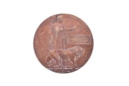 A bronze memorial plaque.