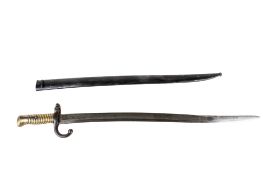 A WWI French chassepot bayonet. Having a ribbed brass handle with scabbard. Total length 71cm.