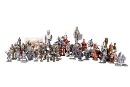 A group of assorted modern die cast metal soldier figures.