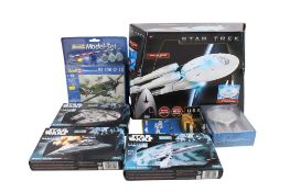 A collection of assorted Star Trek and Star Wars related items, etc.
