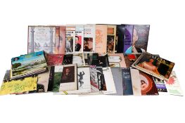 A box of assorted vintage vinyl LP records mostly 1950s and 60s.