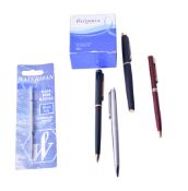 A collection of Waterman pens and accessories.