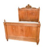 A contemporary pine single bed.