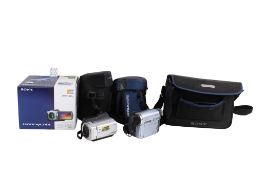 Two Sony Handycam video cameras and accessories.