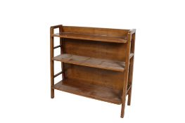A mid-century waterfall bookcase.