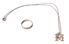 A 9ct gold ring and a yellow metal 'M' pendant and chain.