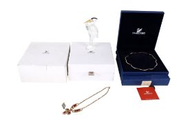 A small group of Swarovski glass items.