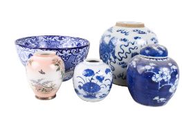Four assorted blue and white ceramic items plus a Japanese vase.