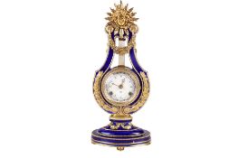 A V&A 'Marie-Antoinette Clock and key.