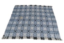 A vintage Drew reversible blue and black Welsh wool blanket.