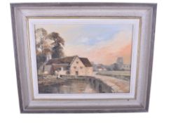 A 20th century oil painting. Signed 'E J Wilson', depicting a cottage beside a river, 16.5cm x 22.