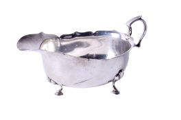 A hallmarked silver sauce boat.