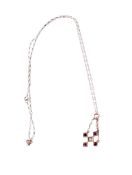 An early 20th century 18ct gold (stamped) pendant. Set centrally with one old cut diamond of 0.