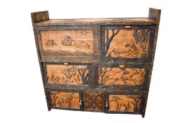 A Zambian handmade wood cabinet.