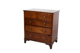 A 20th century Georgian style small mahogany chest of drawers.