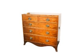 A Victorian mahogany veneered chest of drawers.
