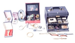 A collection of costume jewellery and wristwatches.