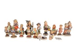 A collection of Goebel Hummel figures.