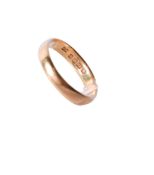A 22ct gold wedding band. Hallmarked, width 3.5mm, size O1/2, weight 3.7g.