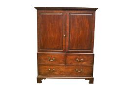 A mahogany linen press.