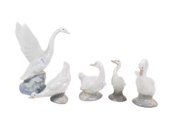 Five assorted Spanish porcelain figures modelled as birds.