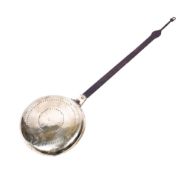 A vintage bed warmer. Having a metal handle and brass cover with impressed decoration, L97.5cm.