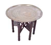 An Anglo Indian folding brass tray top table.