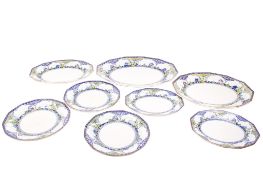 A set of eight Royal Doulton Merryweather Art Deco plates and serving platters.