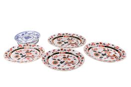 A set of four 19th century hand painted Ironstone plates and a Mintons blue and white footed dish.