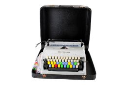A Scheidegger Typomatic TMS portable typewriter.