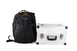 A Jessop aluminum camera case and a Kata camera backpack.
