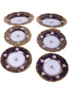 A collection of Wedgwood plates.