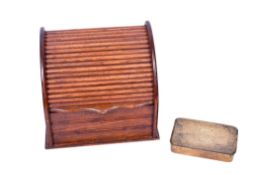 An oak letter rack and a Mary 1914 Christmas tin.