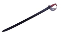 A reproduction sword and scabbard.