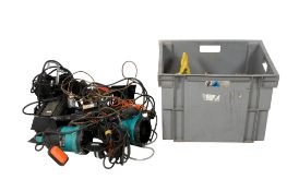 A large box of assorted smaller theatre or studio lights, wires and metal fittings.