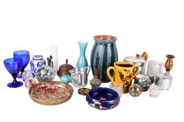 A group of glass and ceramic items.