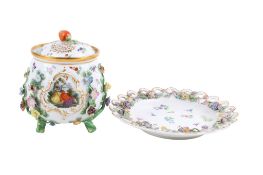A continental 19th century hand painted porcelain potpourri with stand and cover.